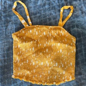 Torrid stretchy Yellow w/white flower crop top